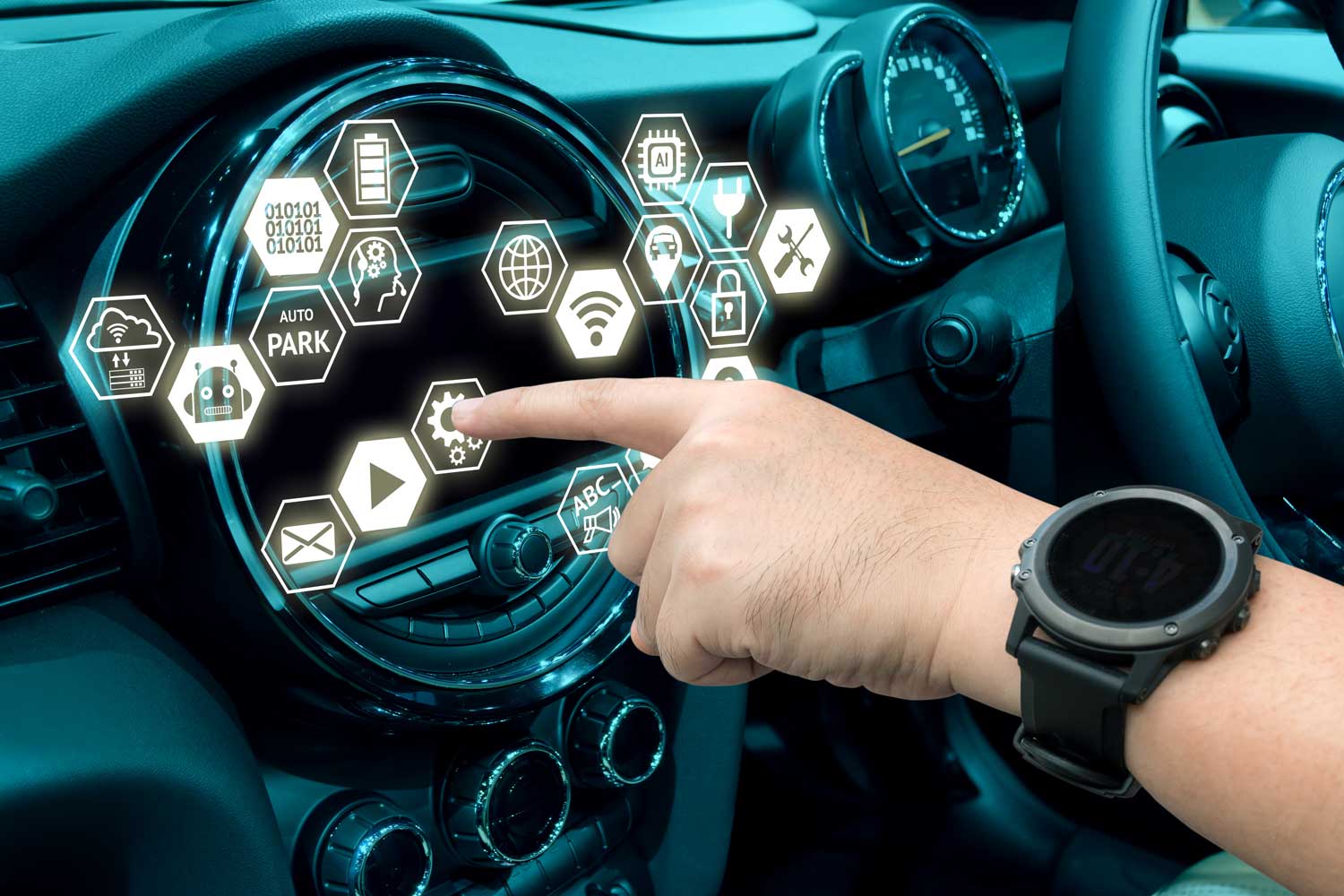 Hand pointing and reaching for a computer touch screen car dashboard