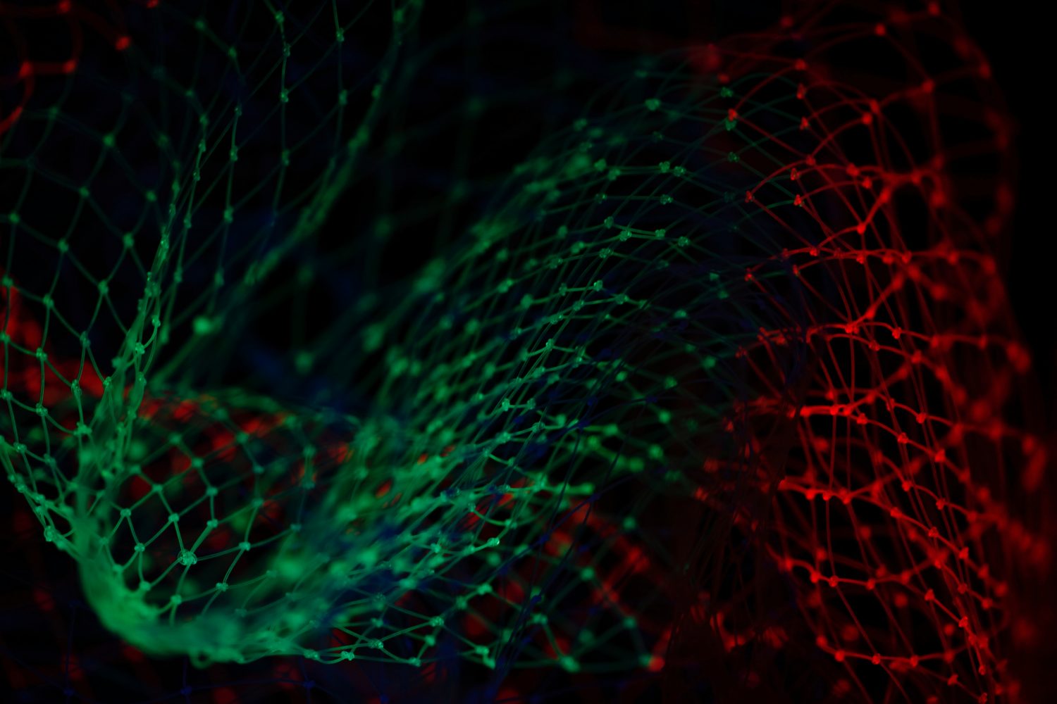 geometric web facing from green to red