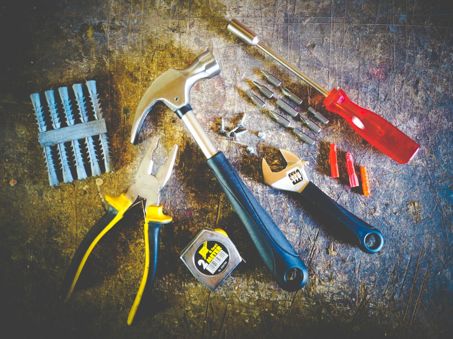 various tools on a distressed background