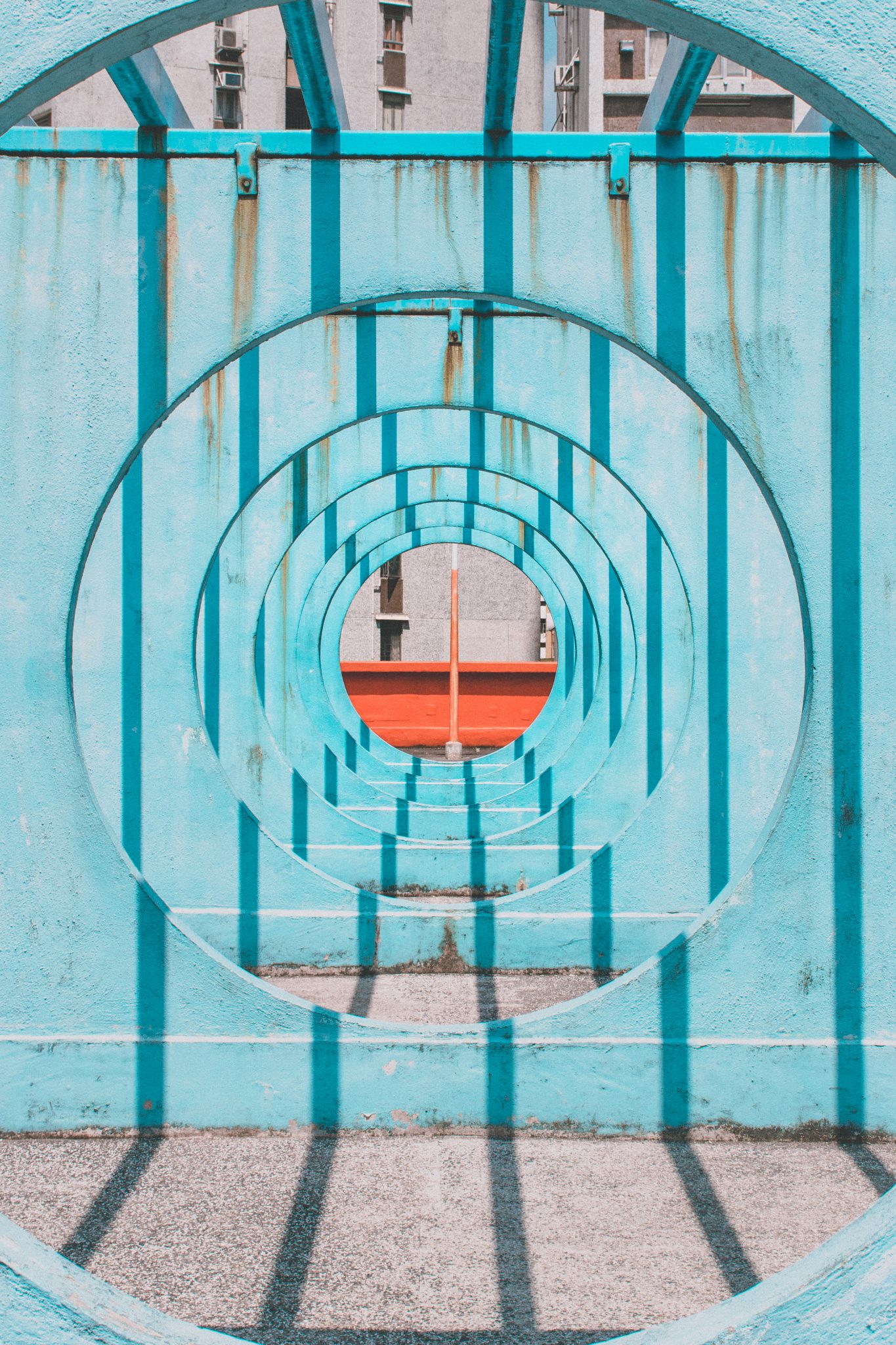 abstract view through a wall in blue and orange