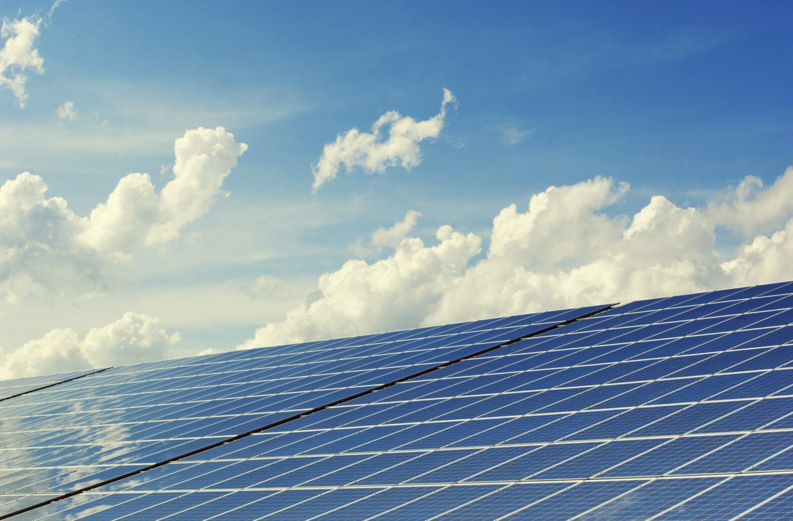 blue sky and clouds with solar panels